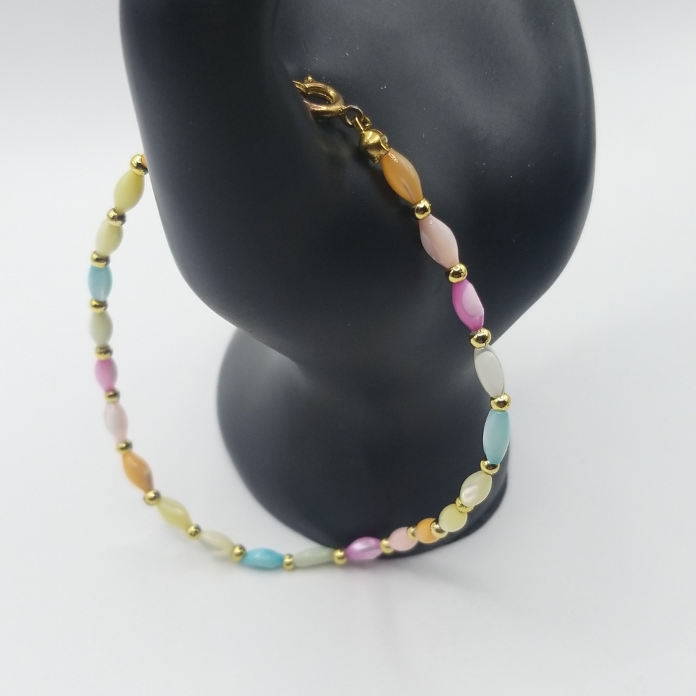Pastel colored glass bead anklet.